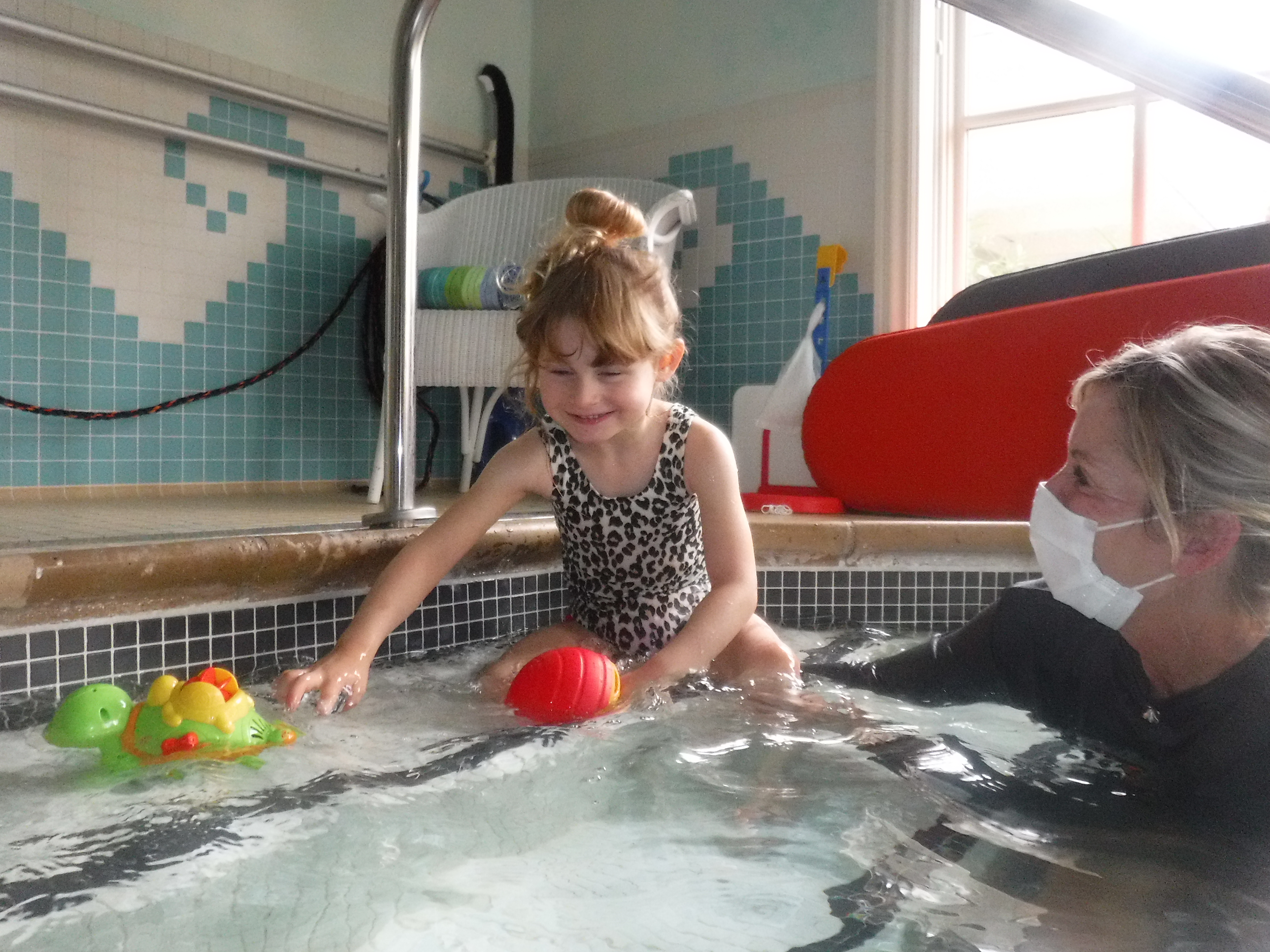 Molly enjoying palliative aquatic therapy at GMCH.